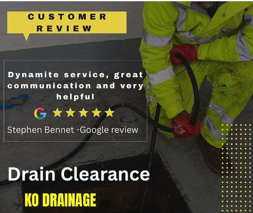 A drainage engineer carrying out drain clearance using high-pressure jetting equipment.